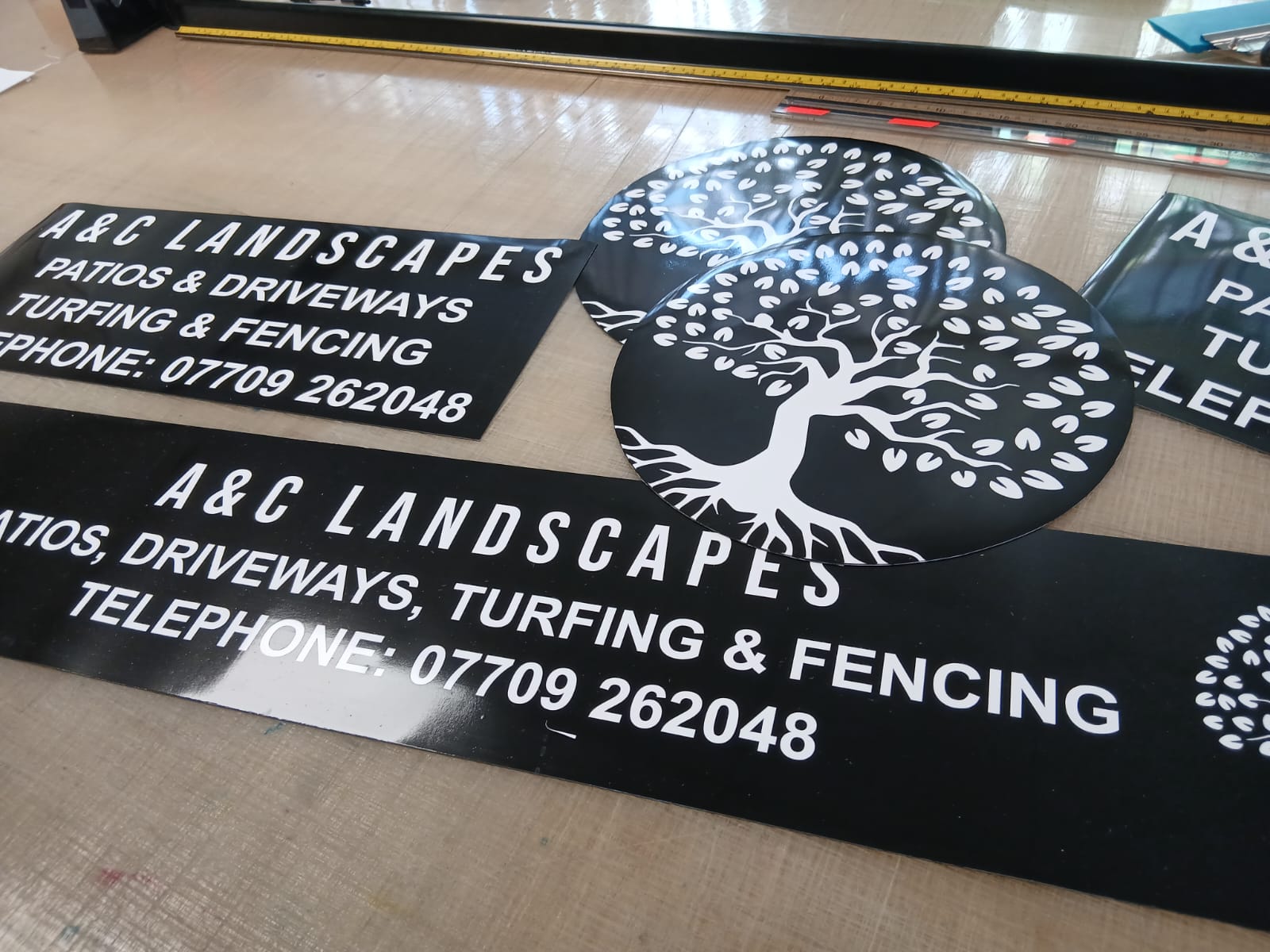 A&C Landscapes branded signage panels