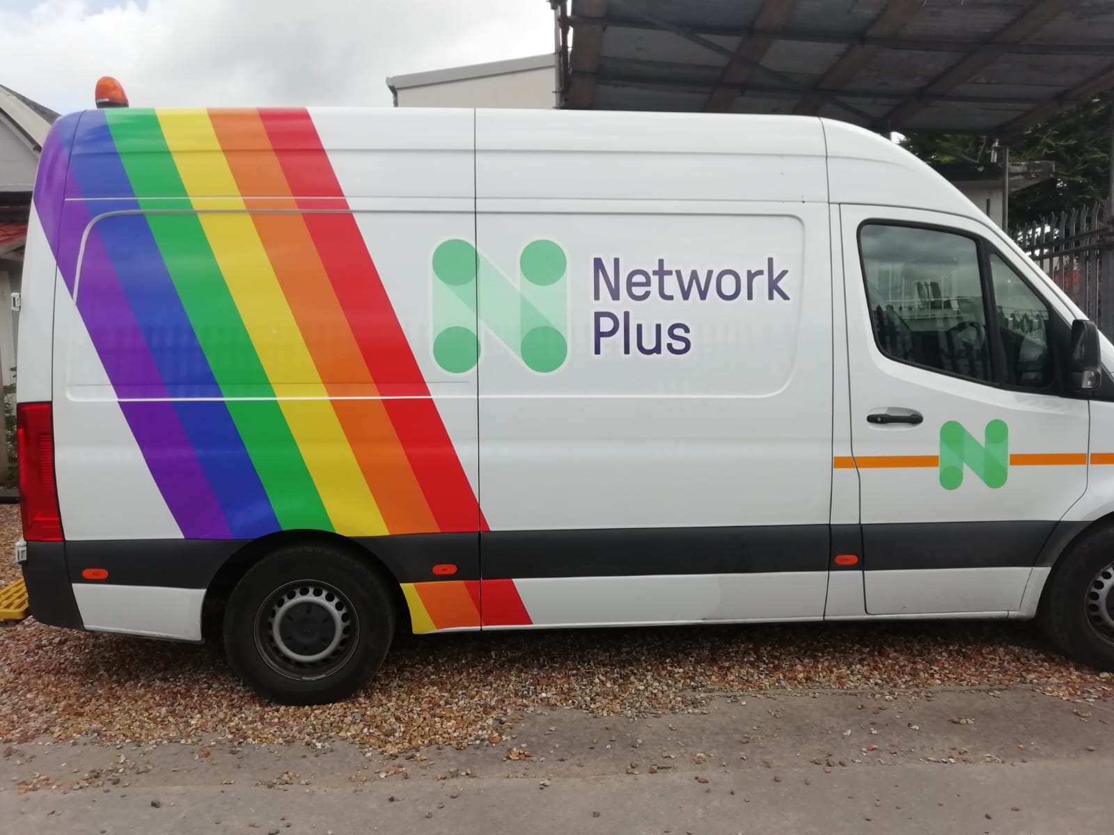 Network Plus rainbow fleet van wrap